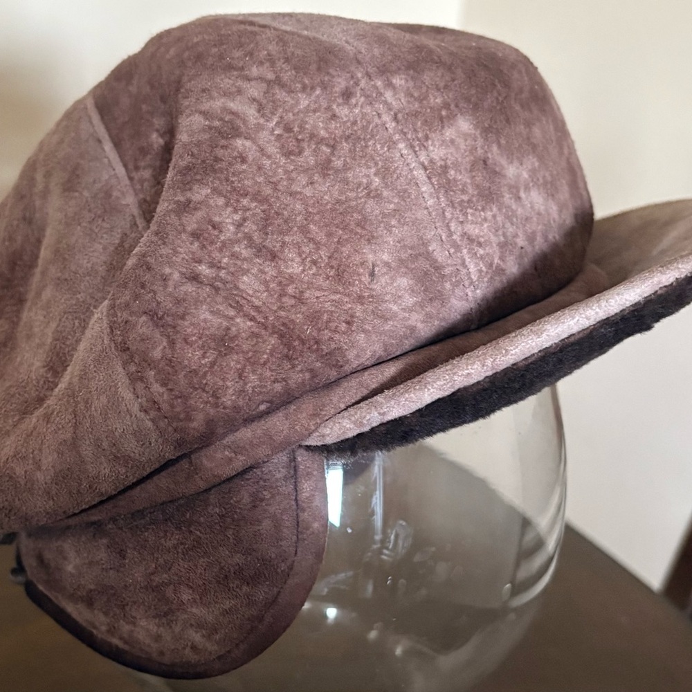 Stylish brown Shearling visor hat for cold days.